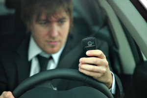 Man texting and driving
