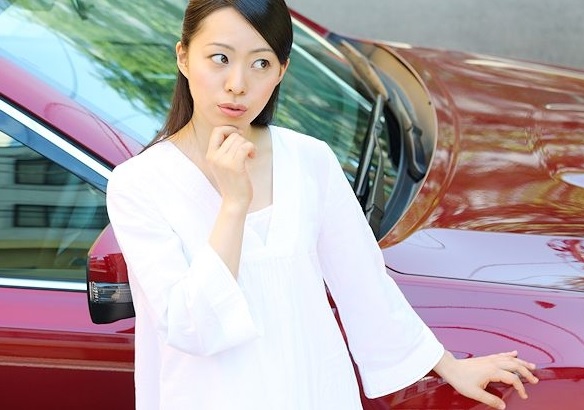 Woman in Milwaukee considering used car purchase